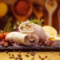 Classic Tuna Wrap · Gourmet wrap made with tuna salad, carrot, and lettuce.