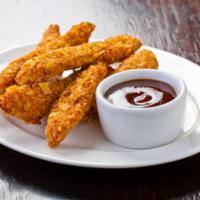 Chicken Fingers · Fresh batch of chicken fingers served with celery, carrots, and honey mustard.