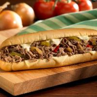 41. Philly Cheesesteak Sandwich · Shredded steak, with sauteed onion, green peppers and melted cheese.