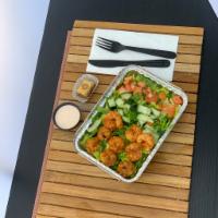 Grilled Shrimp, Mediterranean Salad · Our grilled royal jumbo shrimp salad come on a bed of Mediterranean salad with iceberg lettu...