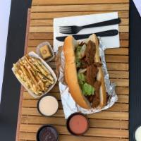 Grilled Steak Sandwich with Lebanese Hand Cut Fries · Our grilled premium flank steak sandwiches come on a french baguette with iceberg lettuce, o...