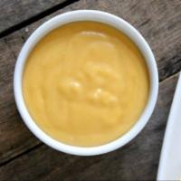 Spicy Cheese Sauce · 1 oz. portion of Spicy Cheese Sauce made from scratch