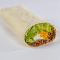 Soft Taco · Seasoned ground beef, cheddar cheese, lettuce and sour cream rolled in a soft flour tortilla.