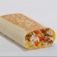 Quesadilla Burrito · Marinated steak, grilled chicken or southwest chicken, with bacon bits, cheddar cheese and p...