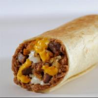 Grilled Grande Burrito · Southwest chicken, steak or taco meat with refritos, crumbled Mexi fries, cheese sauce and r...