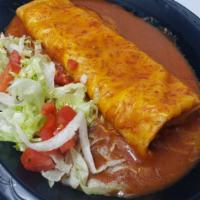 Meat Enchilada · Seasoned ground beef, Monterrey jack cheese and onions rolled in a flour tortilla then toppe...