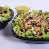 Nut ＆ Berry Chicken Salad · Our lettuce blend topped with grilled chicken, jack cheese, dried cranberries and tasty glaz...