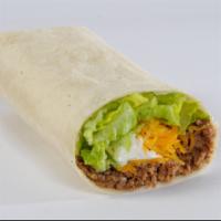 Soft Taco Kids Meal · Seasoned ground beef, cheddar cheese, lettuce, and sour cream rolled in a soft flour tortill...