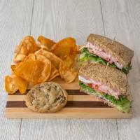 Turkey Lurkey Sandwich Box · Our own roasted turkey, cranberry mayonnaise, Swiss cheese with lettuce and tomato on Lebus ...