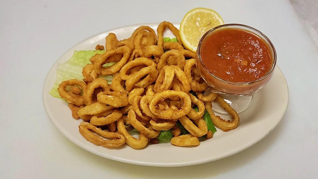 FRIED Calamari · Rings of fresh squid - calamari - that are coated in a flour batter then deep fried. Served with lemon or marinara sauce on side. 