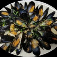 Mussels Possillipo · Mussels sauteed in white wine, garlic and parsley  . 
