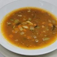 Lentil Soup · A hearty, thick lentil bean soup made with carrots, celery, sauteed onions, chopped tomatoes...
