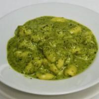 Gnocchi Al Pesto · Light, potato pasta dumplings, served in a homemade pesto sauce made from basil, garlic, pin...