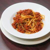 Spaghetti with Meat Sauce · Spaghetti in a homemade tomato sauce with seasoned ground beef. 