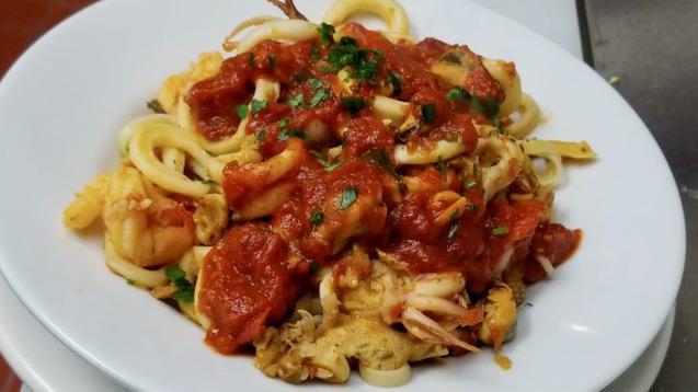Cappellini Al Mare · Thin cappellini pasta in a homemade marinara sauce with shrimp, calamari, clams and mussels. 