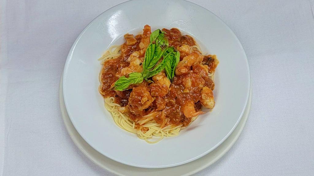 Cappellini with Shrimp Sauce · Thin cappellini pasta served with a sauce made of fresh shrimp, parsley, garlic, olive oil and white wine. 