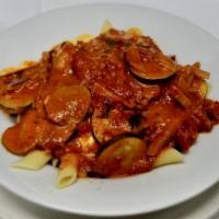 Penne Alla Siciliano · Penne layered with homemade tomato sauce and sauteed eggplant AND FRESH MOZZARELLA. 