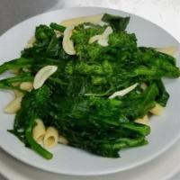 Penne with Broccoli Rabe · Penne with sauteed broccoli rabe in a light olive oil and garlic sauce. 