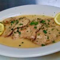 Veal Scaloppine Piccata · Veal cutlets dipped in flour and egg then lightly fried. Served in a sauce made of white win...