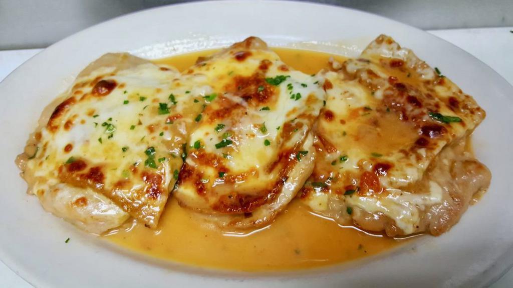 Veal Sorrentino · Veal cutlet topped with prosciutto, eggplant and mozzarella cheese, then browned in a Marsala wine, butter and mushroom sauce. Served with choice of pasta or salad. 