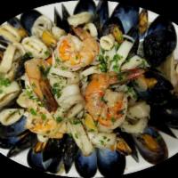 Seafood Combination Plate · Shrimp, mussels, calamari and clams, all sauteed in a marinara sauce or garlic and oil and w...