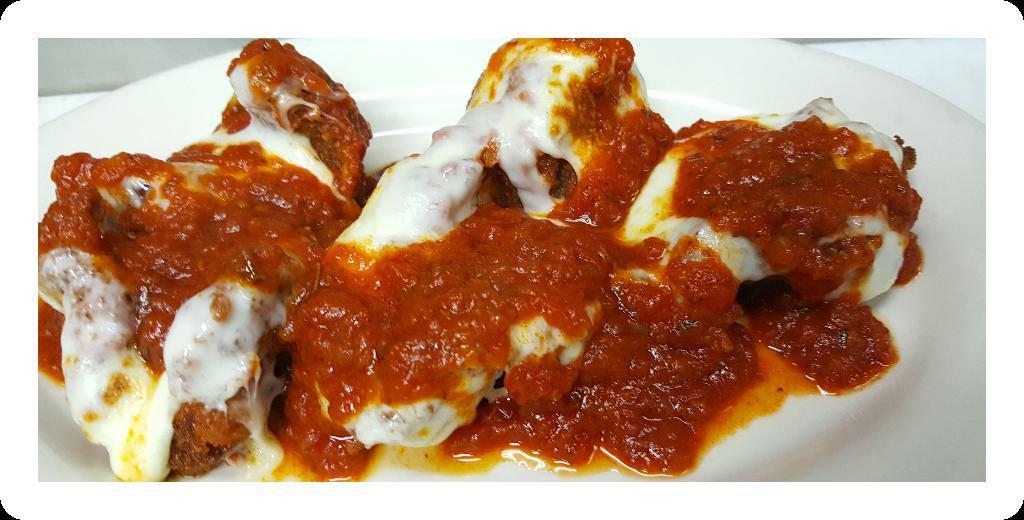Shrimp Parmigiana · Lightly breaded and fried jumbo shrimp, baked with mozzarella cheese and tomato sauce. Served with choice of pasta or salad. 