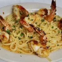 Shrimp Scampi · Jumbo shrimp sauteed with butter, garlic and parsley. Served with choice of pasta or salad. 