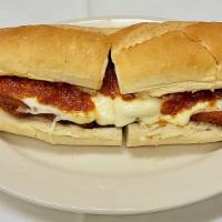 Chicken Parmigiana Hero · Thin chicken cutlets, lightly breaded and fried, served on a hot hero roll with tomato sauce...