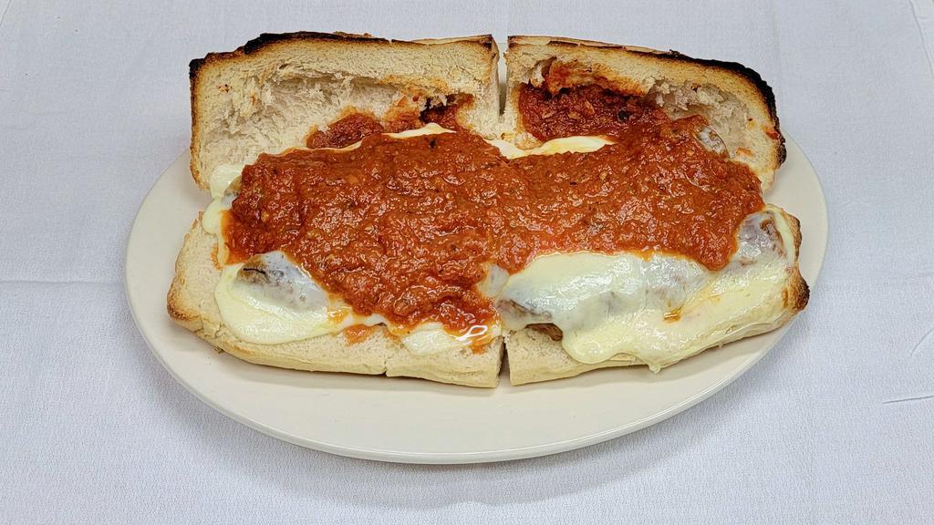 Sausage Parmigiana Hero · Broiled sausage links served on a hot hero roll with tomato sauce and melted mozzarella cheese. 