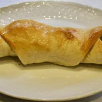 Sausage Roll · Pizza dough is wrapped around mozzarella and chopped sausage, then baked. The ends are left ...