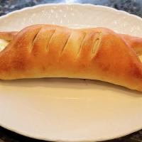 Stromboli · A rolled and baked pizza dough that is filled with mozzarella and your choice of meat. 