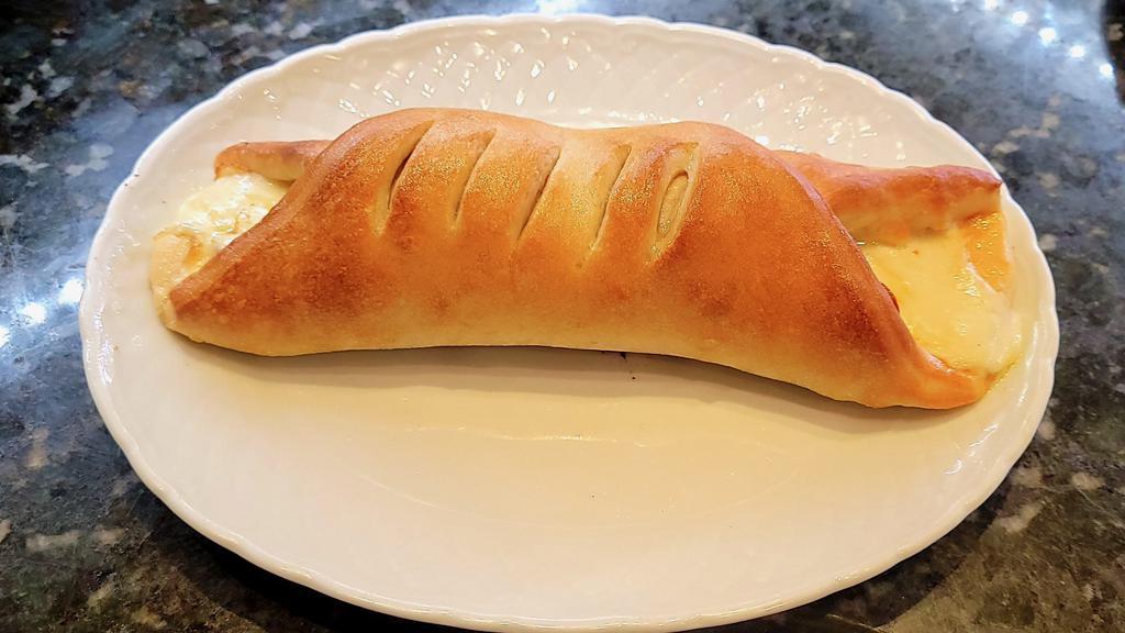 Stromboli · A rolled and baked pizza dough that is filled with mozzarella and your choice of meat. 