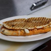 Grilled chicken Buffalo Panini with cheese · With blue cheese.