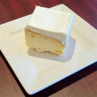 Tres Leches · Sponge cake that is soaked in three kinds of milk: evaporated, condensed and heavy cream. 