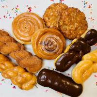 Assorted Fancy Donuts  · Ring shaped fried cake.