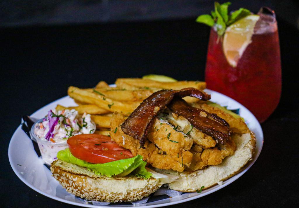 Crispy Chicken BLT · Crispy cooked chicken breast, bacon, lettuce, tomatoes, served with our homemade seasoned chips