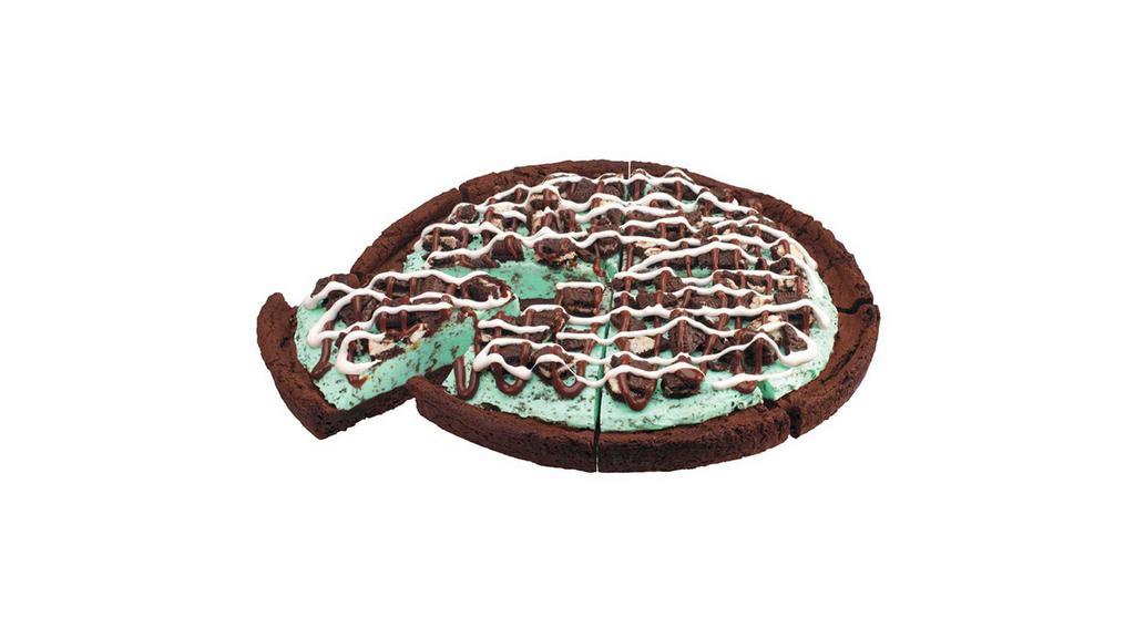 Mint Chocolate Chip Polar Pizza · An ice cream treat you eat like pizza. A double fudge brownie crust with mint chocolate chip ice cream, topped with Oreo cookie pieces, fudge and marshmallow toppings.
