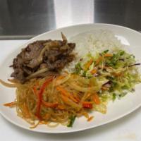 Beef Bulgogi with Japchae · Marinated and grilled beef.