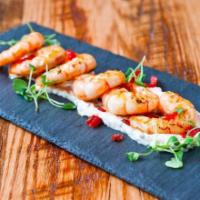 Crevettes a l'Aioli · Grilled shrimps, Provence herbs, sun-dried tomatoes, tarragon aïoli. Gluten Free. Contains N...