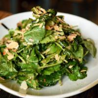Kale Salad · Organic kale, Granny Smith apple, aged cheddar, roasted almonds, garlic vinaigrette. Vegetar...