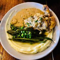 Poulet au Miel · Roasted chicken breast, honey sauce, mashed potatoes, green beans.