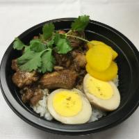 Braised Pork Rice Bowl · Pork belly braised in Chinese spices and soy sauce, with a soy sauce egg, veggies, and pickl...