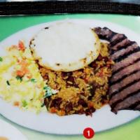 1. Desayuno Tipico · Mixed rice with beans, scrambled eggs, grilled steak and corn cake with cheese.
