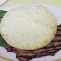 3.  Carne Asada con Arepa con Queso · Grilled steak and corn cake with cheese.