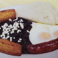 10. Huevos Divorciados · 2 over easy eggs, black beans, tortilla, sausage and cheese.