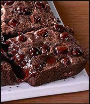 Triple Chocolate Brownie · Chocolate, chocolate, and more chocolate. Dig into this rich, decadent brownie made with sem...