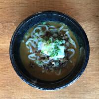 Curry Udon w. Beef · Beef, udon noodle, scallion, soft boiled egg in Japanese curry.