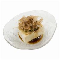 Hiyayakko Tofu · House-made tofu with bonito flakes in soy sauce (cold dish).