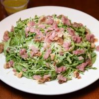 Parma Salad · Figs, prosciutto, shaved parmigiano reggiano, arugula and lemon olive oil. Served with our f...