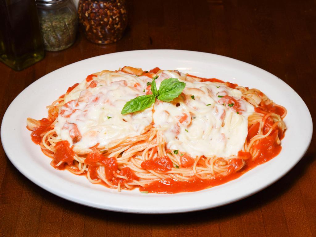 Spaghetti Caprese · Diced tomatoes, olive oil, garlic, fresh basil and melted mozzarella. 